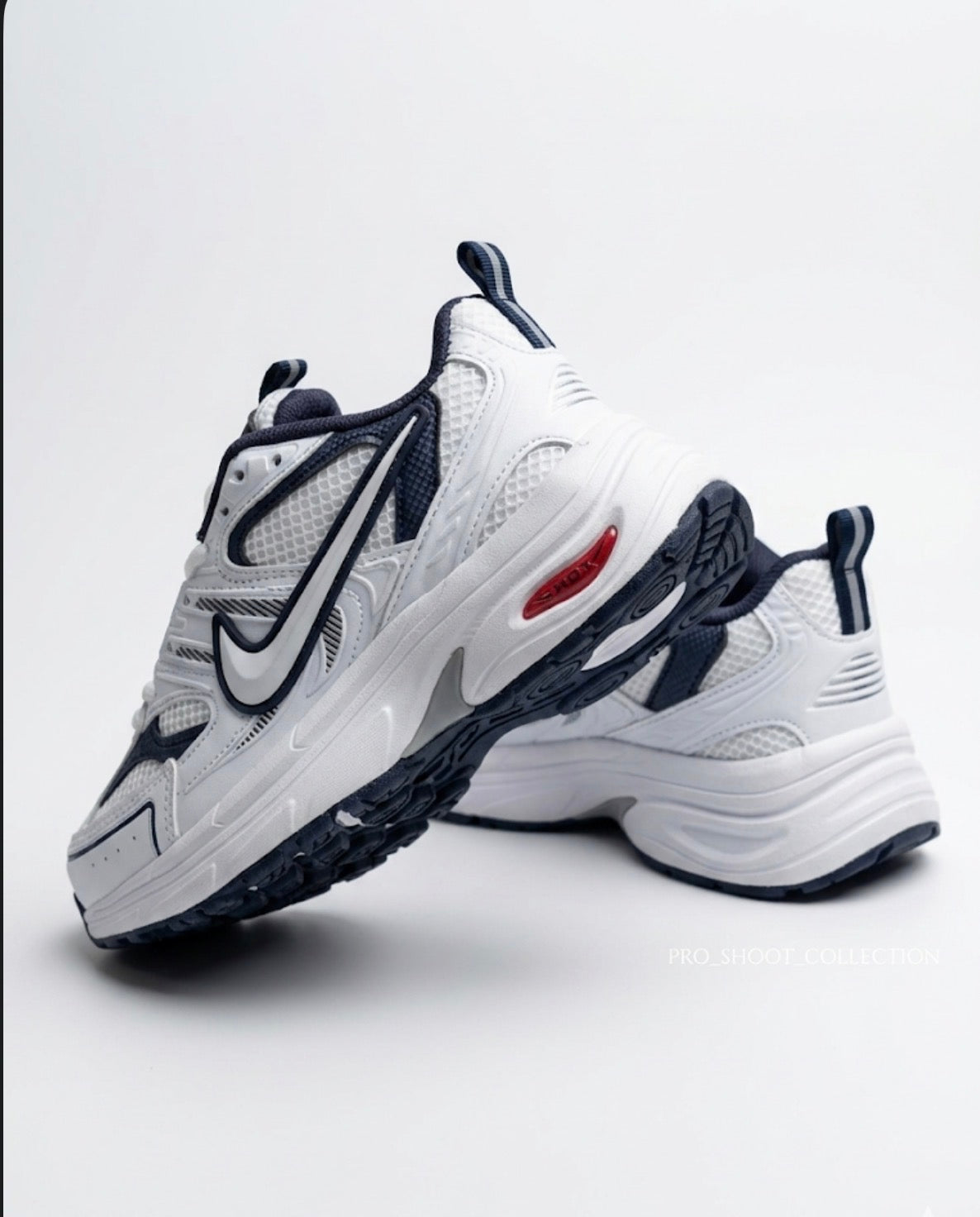 Nike Air Monarch IV – Erkek Spor Ayakkabı | Beyaz & Lacivert & Kırmızı